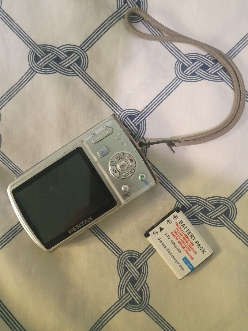 Pentax Optio M30 (Read Description!) (Category: Cameras) located in Silay City. Submitted by louixxxe (Listing ID 1369987922, Image 3). Description: Pentax Optio M30 (NEGOTIABLE) Description: Selling my Pentax Optio M30 compact digital camera. ~ Feel free to message for more photos and questions~ Camera Details: ~ 7.1 Megapixels ~ 3x Optical Zoom Lens ~ 2.5" LCD Screen ~ Slim and lightweight metal body Condition: ~ Used it recently for a short va