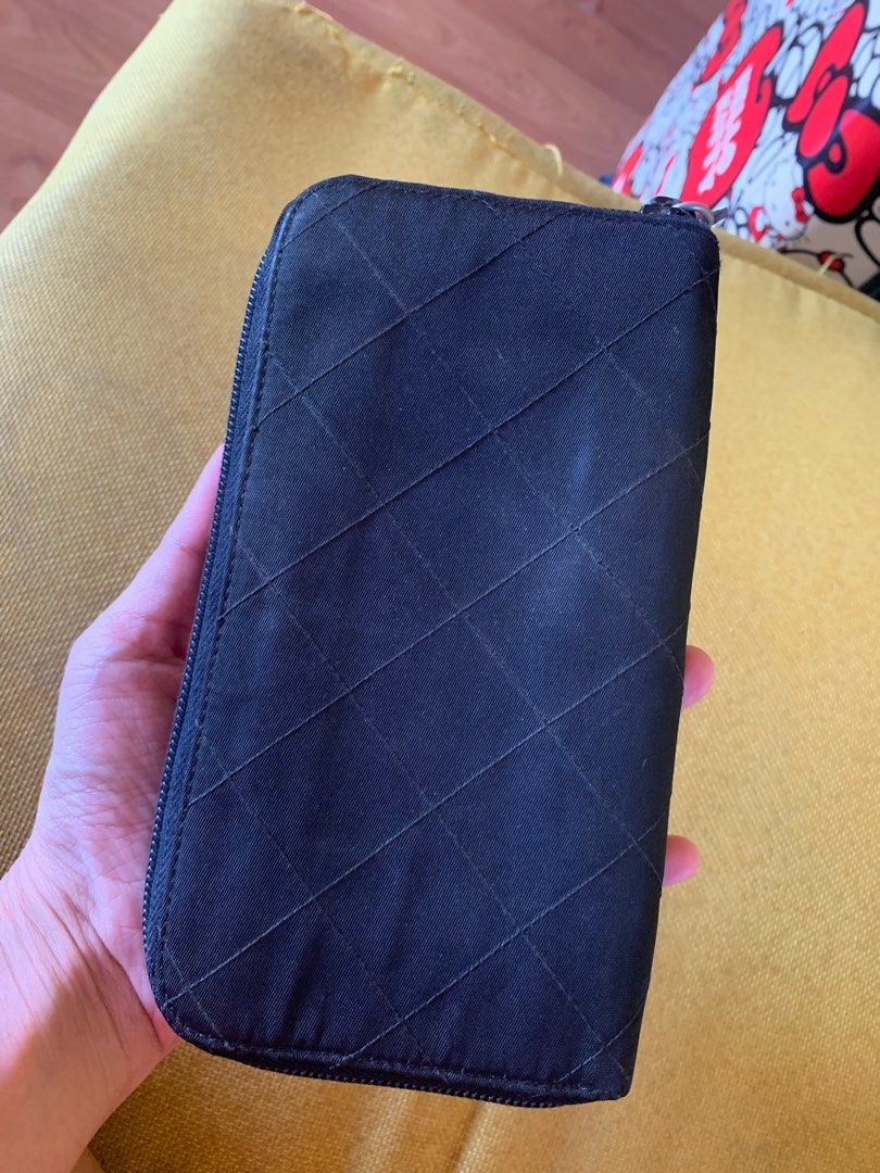 Prada long wallet (Category: Luxury Bags & Wallets) located in Las Pinas. Submitted by yolk.ph (Listing ID 1369941980, Image 2). Description: Prada nero long wallet Authentic; bought in japan With auth card No major flaws just signs of usage.