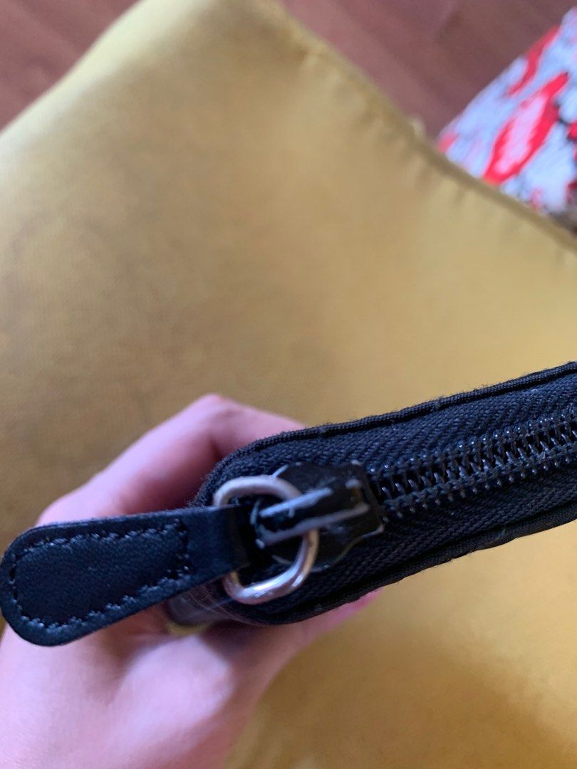 Prada long wallet (Category: Luxury Bags & Wallets) located in Las Pinas. Submitted by yolk.ph (Listing ID 1369941980, Image 3). Description: Prada nero long wallet Authentic; bought in japan With auth card No major flaws just signs of usage.