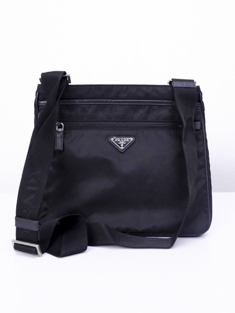Prada Sling Bag for Men Black Nylon (Category: Luxury Bags & Wallets) located in Pasig City. Submitted by clothesandthings_ (Listing ID 1369832616, Image 2). Description: Authentic Retail price at 60,000 Bag only No functional issues Aesthetic 6/10 signs of normal use.