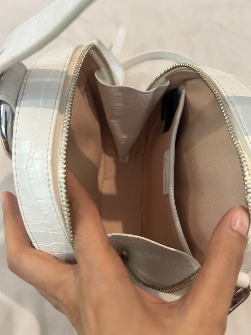 Rebecca Minkoff Bag (Category: Cross-body Bags) located in Pasig City. Submitted by uniquegifts1234 (Listing ID 1369904057, Image 3). Description: Lightly used bag by Rebecca Minkoff With long strap and dust bag .