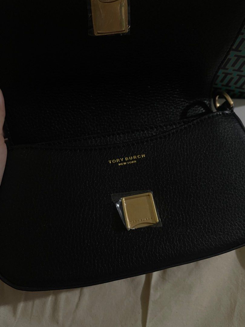 Tory Burch small bag (Category: Luxury Bags & Wallets) located in Pasig City. Submitted by y1iin (Listing ID 1370018136, Image 3). Description: -Original - Has two Straps(chain&strap) -Rush Selling -Never been used.