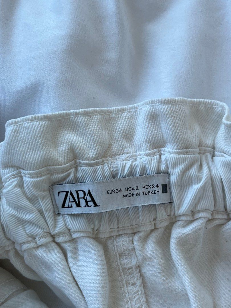 Zara White Paperbag Jeans (Category: Other Bottoms) located in Paranaque City. Submitted by basic_finds8 (Listing ID 1369971123, Image 2). Description: Zara Paperbag Jeans (White) Barely used (1-2times) Loose fit Fits Small to maybe Medium.