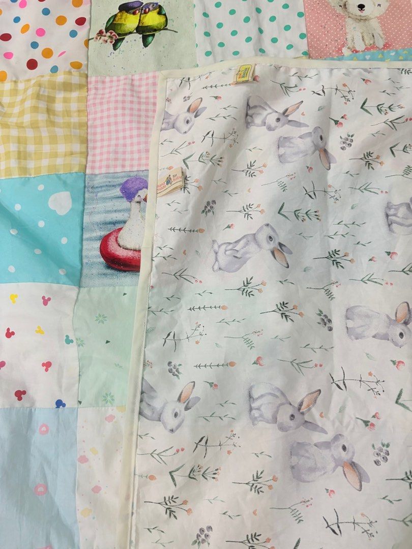 Animals square patchwork blanket (Category: Bedding & Towels) located in Singapore. Submitted by pigeon.wong (Listing ID 1366003473, Image 3). Description: Brand new and ready stock Handcrafted animals square patchwork blanket suitable for kids height below 140cm. Size: 119cm width x 143cm length Materials: cotton fabric Free organza pouch Price incl courier .
