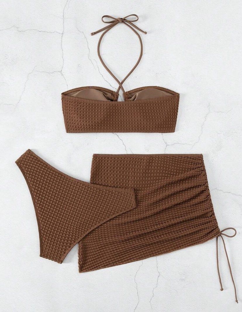 Brown Criss Cross Halter Bra & Bikini Set (Category: Bikinis & Swimsuits) located in Manila. Submitted by jes_ssi (Listing ID 1366888832, Image 1). Description: ⤷ Used once ⤷ This is the actual color and picture ⤷ L size ⤷ Can fit to M - L size frame. ⤷ All in set ⤷ SF shouldered by buyer. (Lalamove/Grab Express mode of courier only).