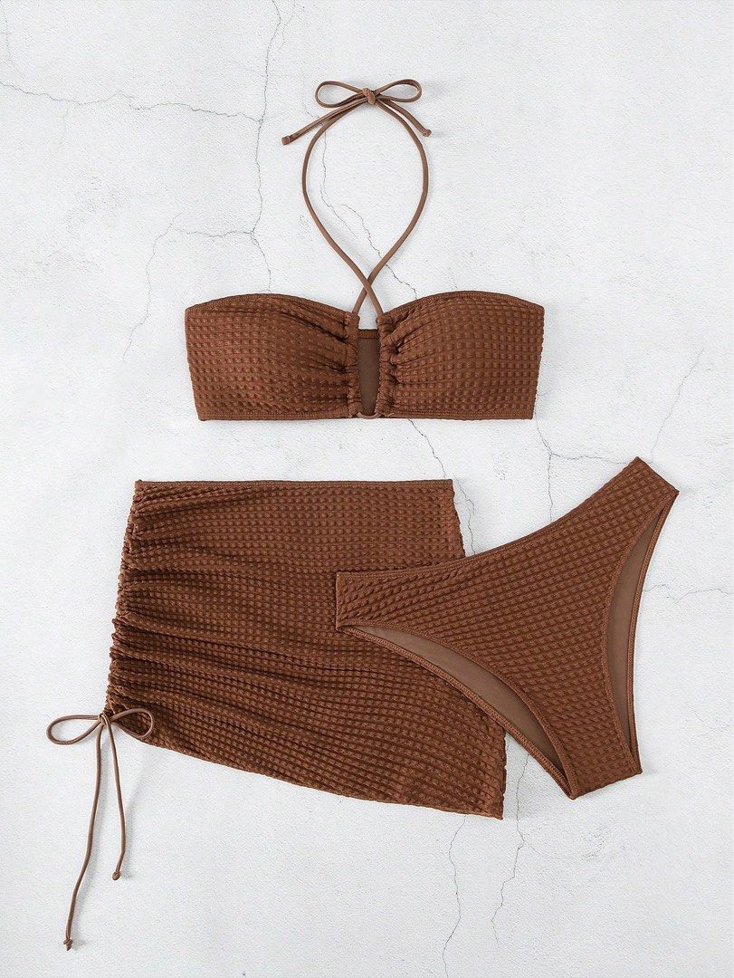 Brown Criss Cross Halter Bra & Bikini Set (Category: Bikinis & Swimsuits) located in Manila. Submitted by jes_ssi (Listing ID 1366888832, Image 2). Description: ⤷ Used once ⤷ This is the actual color and picture ⤷ L size ⤷ Can fit to M - L size frame. ⤷ All in set ⤷ SF shouldered by buyer. (Lalamove/Grab Express mode of courier only).