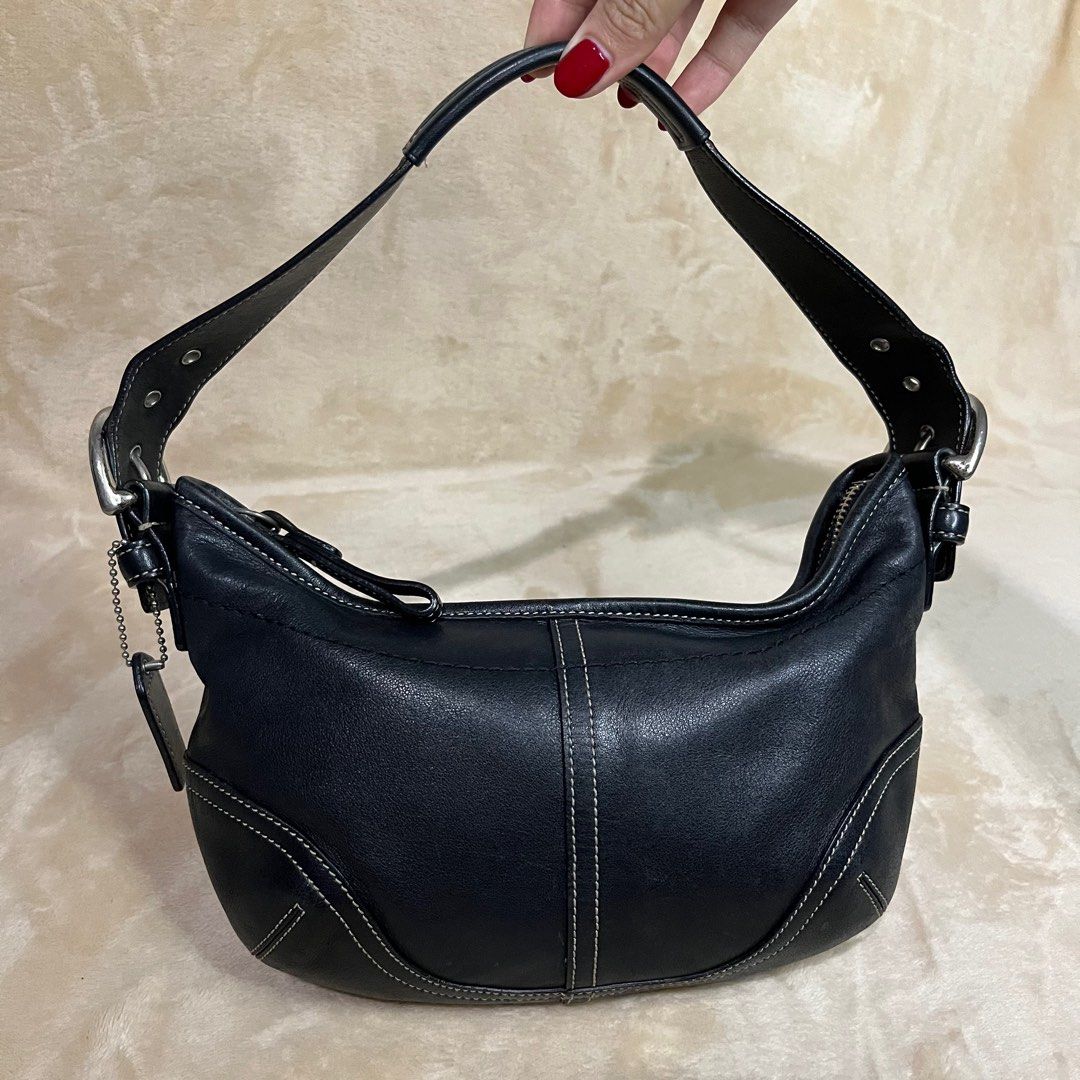Coach Soho Mini Hobo Black Leather Kili (Small) (Category: Luxury Bags & Wallets) located in Quezon City. Submitted by baileys_threads (Listing ID 1366768623, Image 1). Description: Please refer to photos Good condition 8.5/10 (hardware fadings) 🏷️ ₱3500 only! LP Open for Layaway 👜.