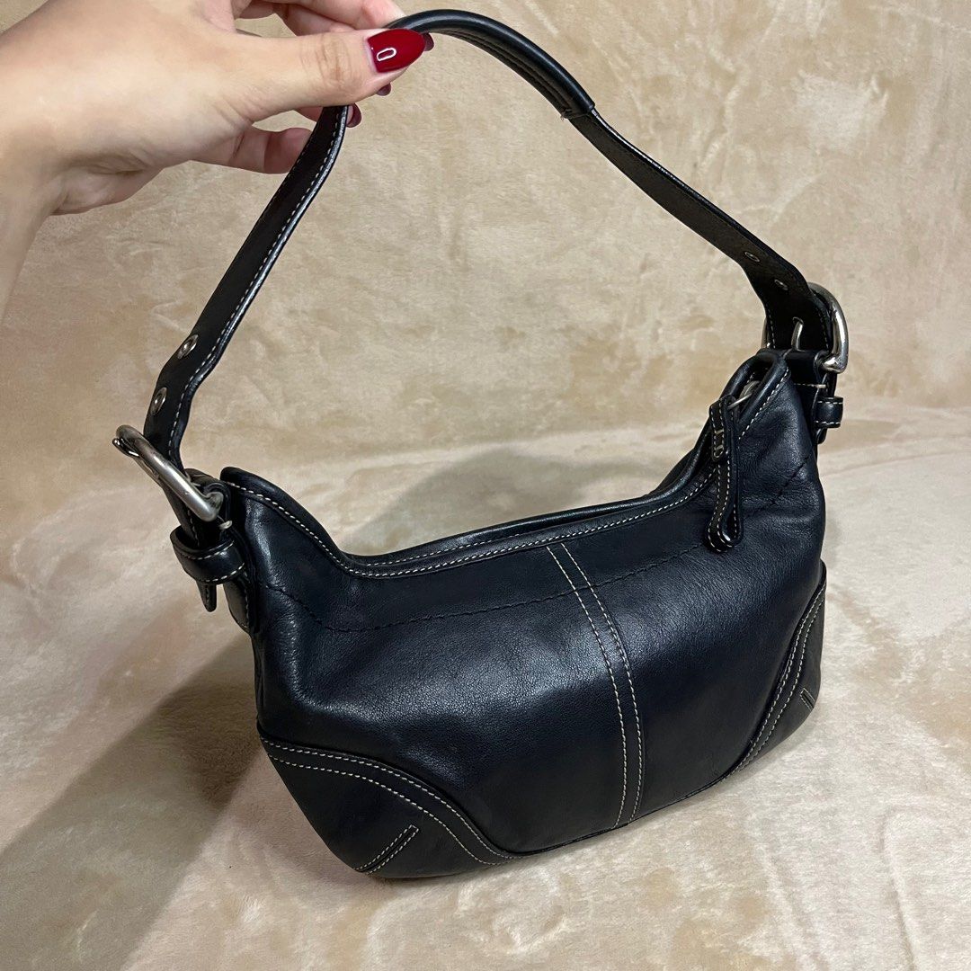 Coach Soho Mini Hobo Black Leather Kili (Small) (Category: Luxury Bags & Wallets) located in Quezon City. Submitted by baileys_threads (Listing ID 1366768623, Image 2). Description: Please refer to photos Good condition 8.5/10 (hardware fadings) 🏷️ ₱3500 only! LP Open for Layaway 👜.