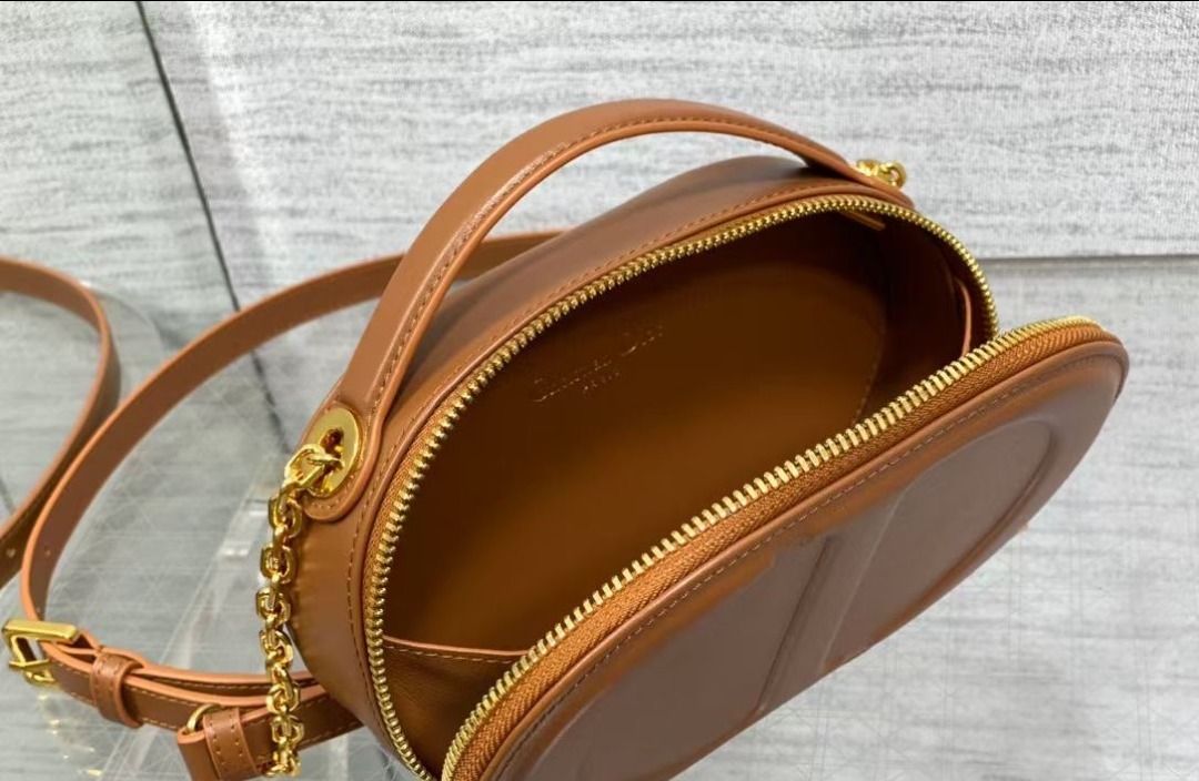 DIOR CD Signature / Detachable & Adjustable Strap / Embossed Logo / Calfskin Leather / Camera Crossbody Shoulder Bag / Women's / Brown (Category: Cross-body Bags) located in Singapore. Submitted by elsepastuc76332 (Listing ID 1366829279, Image 3). Description: .