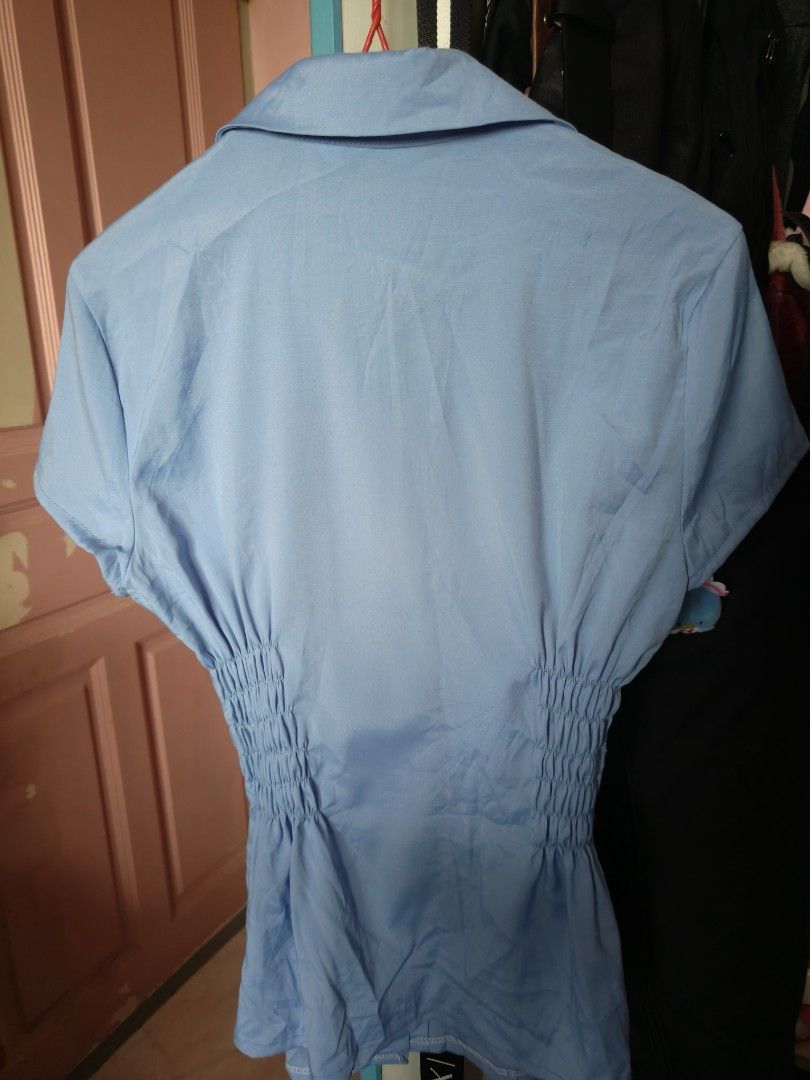 Vintage Thrifted Y2k Cinched Fitted Blue Button Up Blouse Office Siren (Category: Blouses) located in Singapore. Submitted by peanutbuttered (Listing ID 1366810615, Image 2). Description: super cute!! but doesn't fit my bust size... would fit s-m in my opinion! only tried on once although tag is cut off pls help clear >< +$3 for tracked mail!.