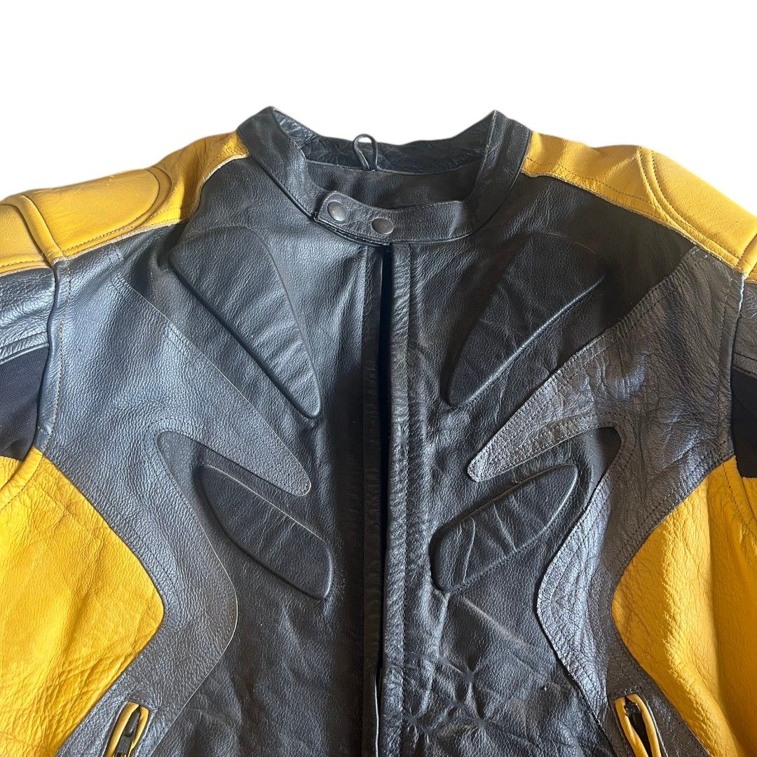 Joe Rocket Racing Jacket (Category: Coats, Jackets and Outerwear) located in Sison. Submitted by shoot.your.offer (Listing ID 1366857867, Image 3). Description: Joe Rocket Leather Racing Jacket Padded Elbow and Shoulder Excellent Condition 23" width 24" length (front) 27" length( back).