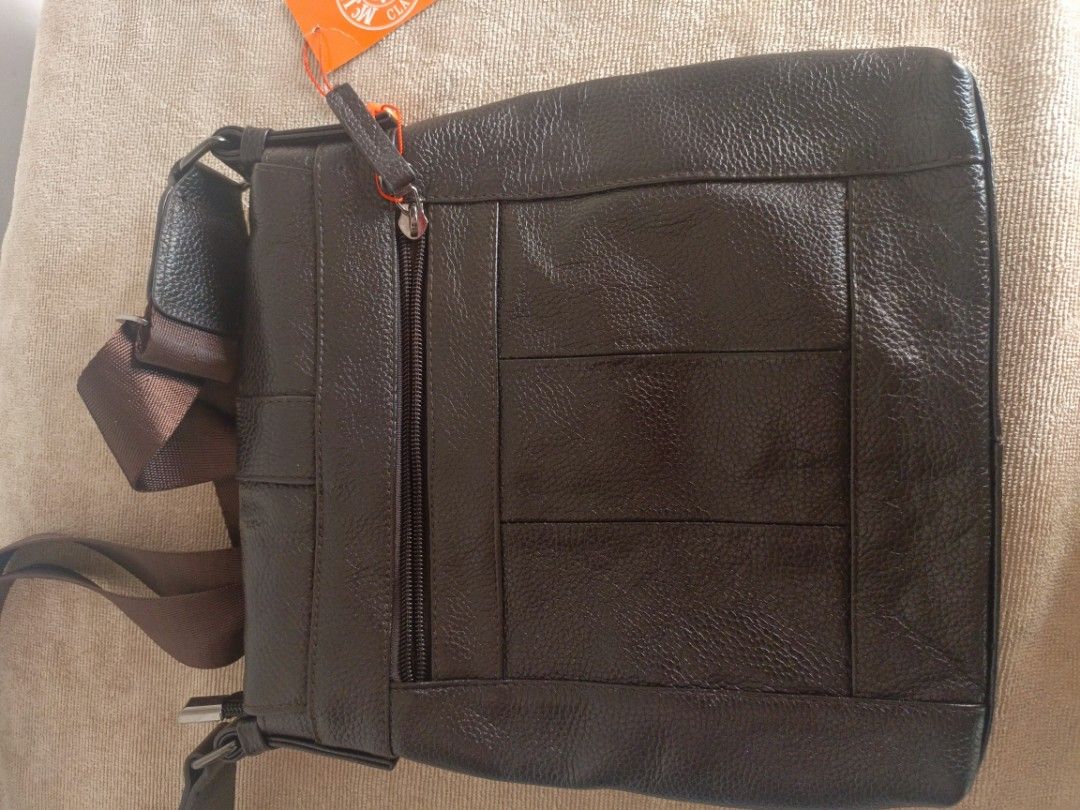 McJim Sling Bag (Category: Sling Bags) located in San Jose del Monte. Submitted by m_nshop (Listing ID 1366815081, Image 3). Description: brand new nakatago lang po hindi nagamit brown po ang color negotiable po.
