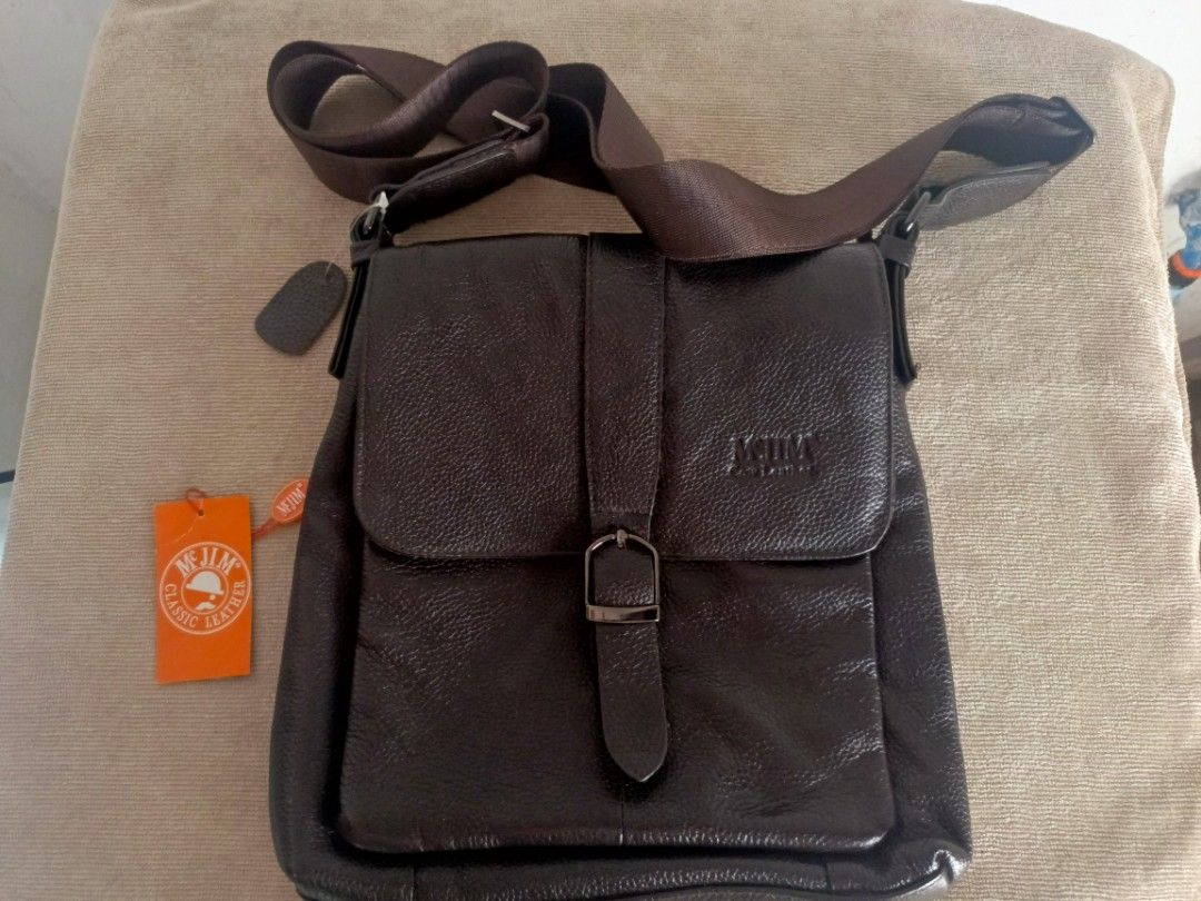 McJim Sling Bag (Category: Sling Bags) located in San Jose del Monte. Submitted by m_nshop (Listing ID 1366815081, Image 1). Description: brand new nakatago lang po hindi nagamit brown po ang color negotiable po.