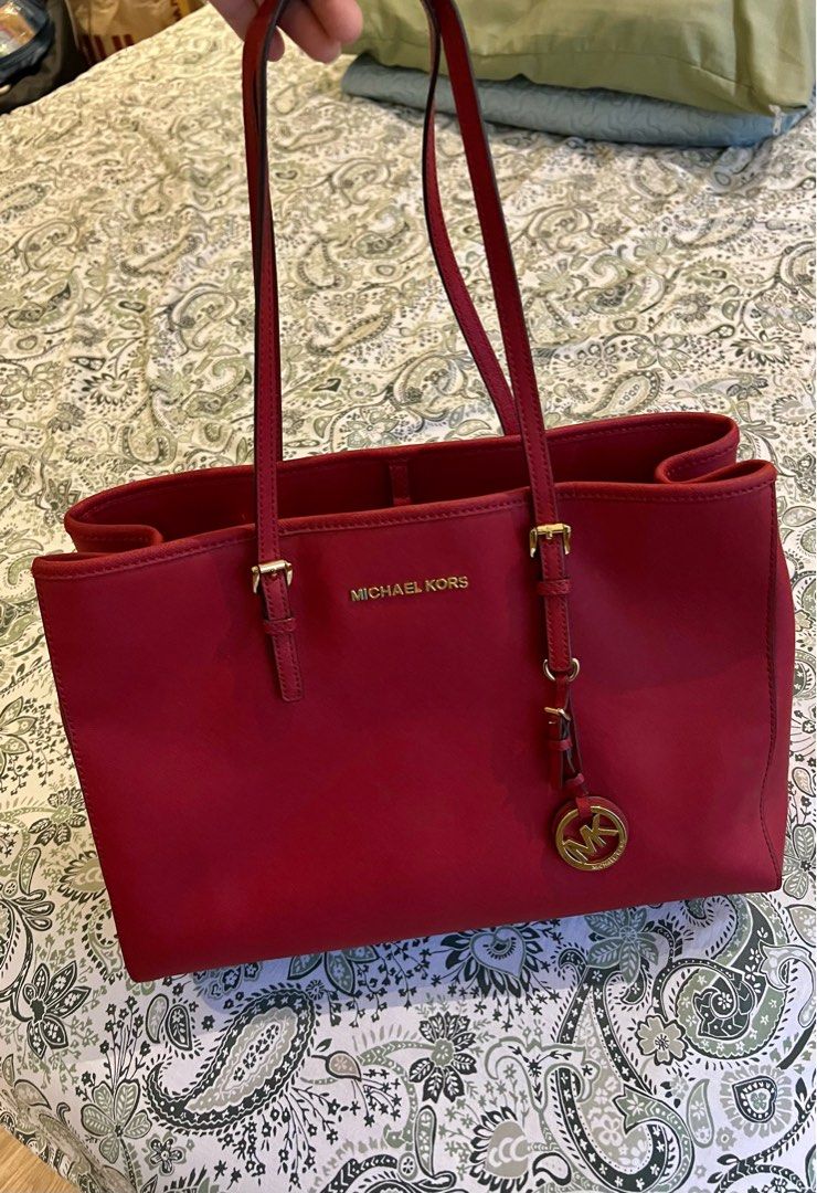 Michael Kors Red Hand Bag / Top Handle Bag (Category: Luxury Bags & Wallets) located in Paranaque City. Submitted by lois.ng (Listing ID 1366741700, Image 1). Description: Authentic No issues Pm for more details!.