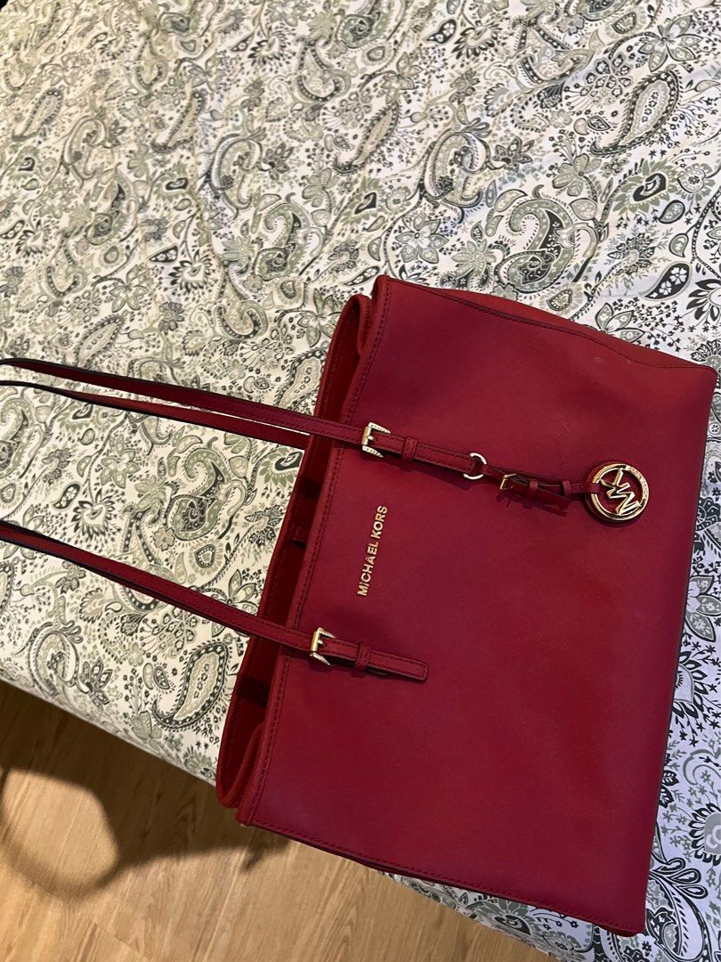 Michael Kors Red Hand Bag / Top Handle Bag (Category: Luxury Bags & Wallets) located in Paranaque City. Submitted by lois.ng (Listing ID 1366741700, Image 2). Description: Authentic No issues Pm for more details!.