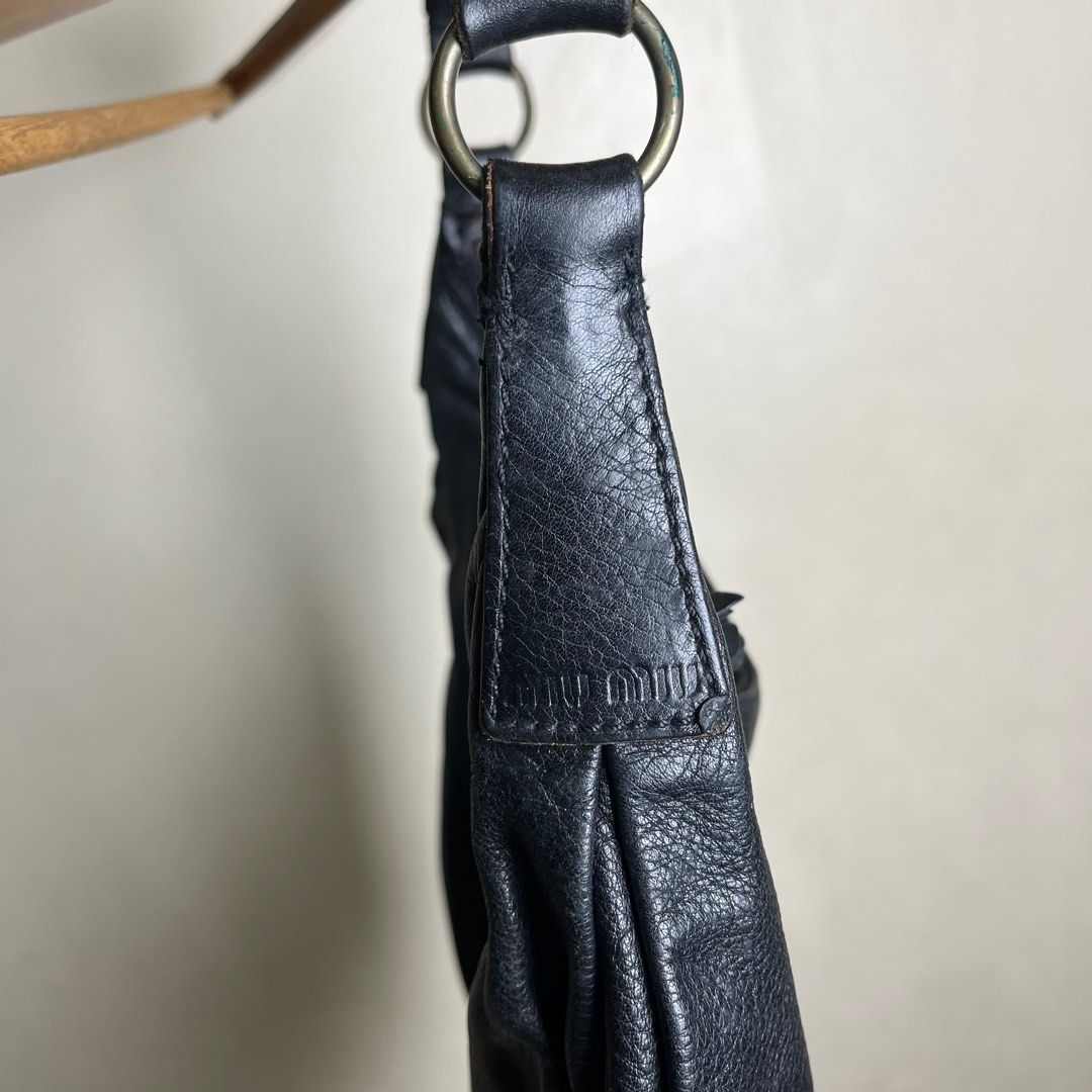 MIU MIU BY PRADA HAND / SHOULDER BAG (Category: Luxury Bags & Wallets) located in Los Banos. Submitted by _limitedsupply (Listing ID 1366825033, Image 3). Description: MIU MIU BY PRADA HAND / SHOULDER BAG Height: 13 inches Width: 12 inches Depth: 5.5 inches Handle Length: 7.5 inches RANK AB Discoloration inside and Minimal scratch at the bottom of the bag but not noticeable Price: 12,500 + sf.