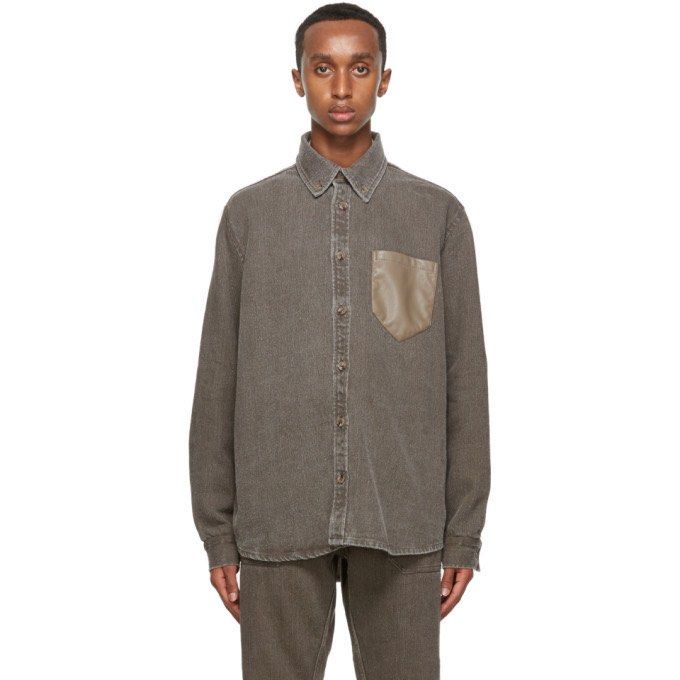 NANUSHKA Oversized Dome Denim Shirt (Category: Luxury Apparel) located in Dasmarinas. Submitted by bandananowheree (Listing ID 1366762127, Image 2). Description: Long sleeve non-stretch linen denim shirt in brown. Fading throughout. Buttoned spread collar. Button closure at front. Grained faux-leather patch pocket at chest. Shirttail hem. Two-button barrel cuffs. Tortoiseshell hardware..