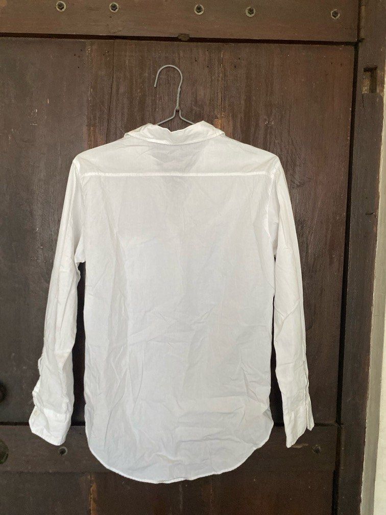 P Zara White Button Up (Category: Blouses) located in Paranaque City. Submitted by chowkiesells (Listing ID 1366772120, Image 2). Description: .