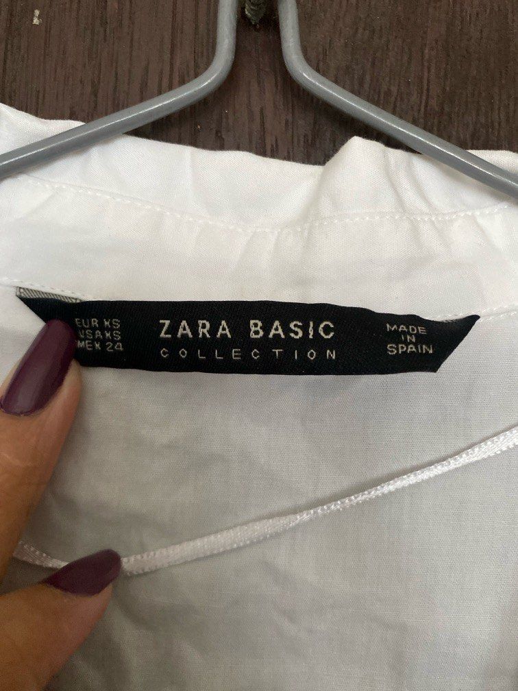 P Zara White Button Up (Category: Blouses) located in Paranaque City. Submitted by chowkiesells (Listing ID 1366772120, Image 3). Description: .