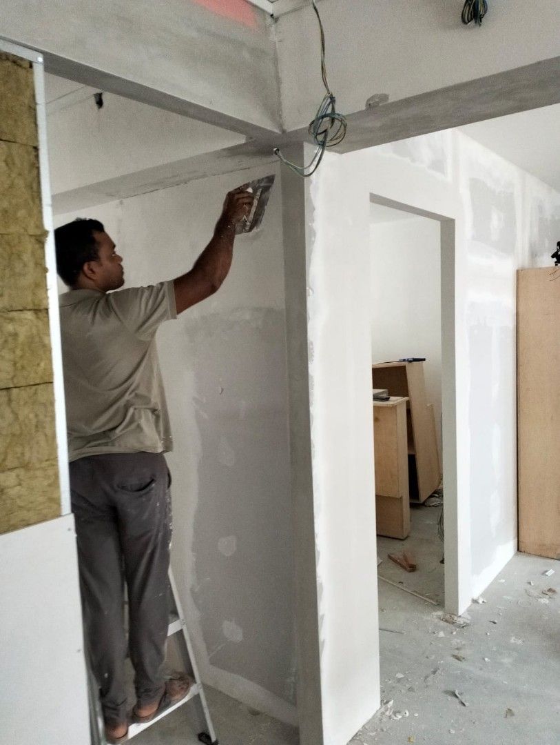 Partition Wall,Fake Wall, False Wall, Drywall,Rockwool, Soundproof Wall, Door Installation,Room Divider, Arch Wall, Arch Wall With Shelve, Lights Installation. (Category: Drywall Partition & False Ceiling) located in Singapore. Submitted by home_reno (Listing ID 1366811359, Image 1). Description: Hello Dear Sir/Mam We specialize in a comprehensive range of professional services to enhance your space. *Our Services:* •False Ceiling •L-Box Installa