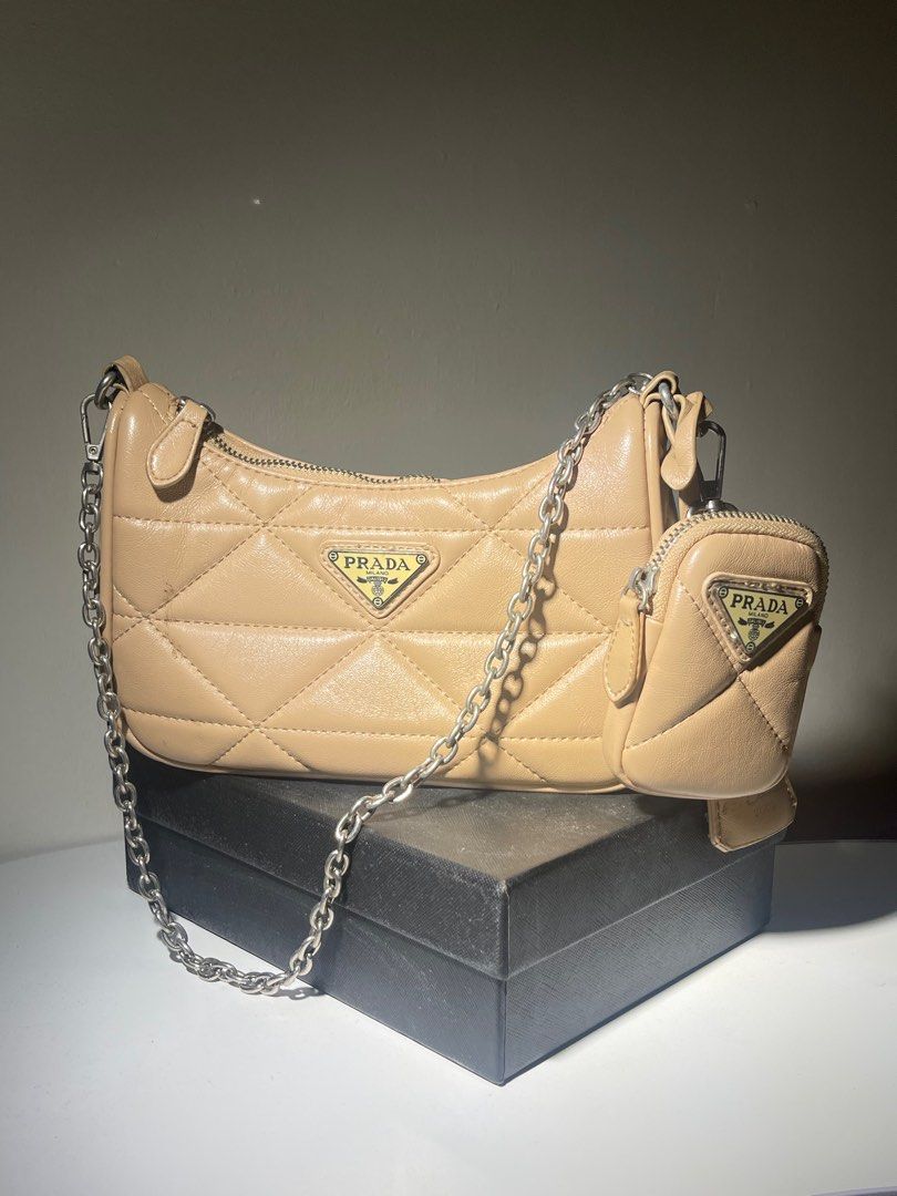 Pradä beige shoulder/sling bag with small pocket (Category: Luxury Bags & Wallets) located in Taguig. Submitted by declutterwithtally (Listing ID 1366902826, Image 1). Description: RFS: DECLUTTERING👜 ALL ACTUAL PICTURES POSTED‼️ 📍Available for same day delivery (every morning / lunch WED-SAT ) MEET UP (FREE EVERY SUNDAY- MONDAY-TUESDAY ) 🚚JNT/LBC anywhere in PH 💵GCASH/ MAYA / BPI no refunds, return, exchange once handed over to courier of cho