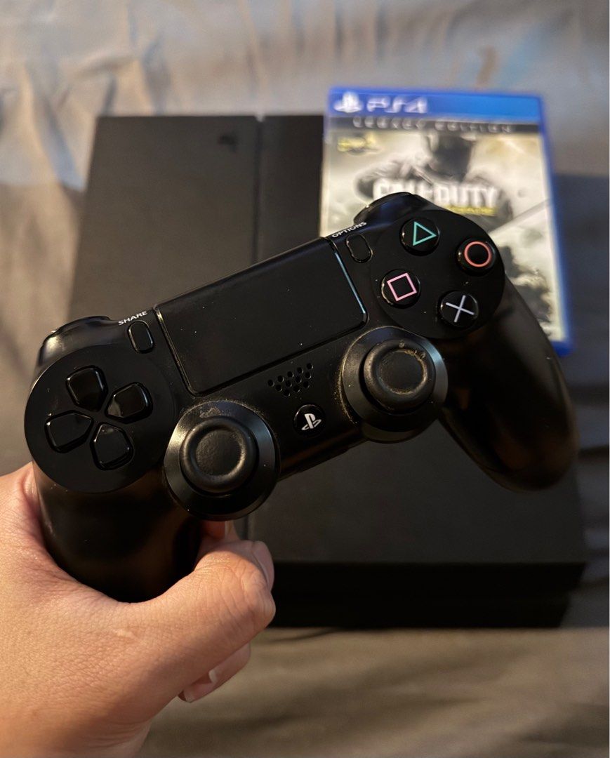 PS4 Phat 1TB + 1 controller ( 1CD) (Category: PlayStation) located in Pasig City. Submitted by robbiseraphin (Listing ID 1366907682, Image 2). Description: Review item description: • PS4 Phat 1TB + 1 original controller 1 4 CD game (latest firmware) no original box. Games: - Call of duty infinite warfare + modern warfare remastered (legacy edition) Price is = 5,500 php —————— Item location is Pasig. Unli-testing. PM if interested or message at 09