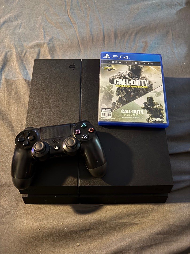PS4 Phat 1TB + 1 controller ( 1CD) (Category: PlayStation) located in Pasig City. Submitted by robbiseraphin (Listing ID 1366907682, Image 1). Description: Review item description: • PS4 Phat 1TB + 1 original controller 1 4 CD game (latest firmware) no original box. Games: - Call of duty infinite warfare + modern warfare remastered (legacy edition) Price is = 5,500 php —————— Item location is Pasig. Unli-testing. PM if interested or message at 09