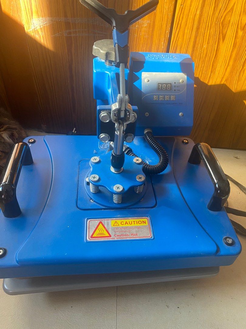 Saphire Heat press 6 in 1 (Category: Craft Supplies & Tools) located in Quezon City. Submitted by mimisaplan (Listing ID 1366909391, Image 1). Description: Moving Out Sale and Upgrade !!!! Six functionalities, one amazing machine! Our 6-in-1 Heat Press handles t-shirts, mugs, plates, caps, and pens with ease. Get professional heat transfer results and unleash your creativity. Key Features to Consider Including in Your Actual Listing Platen Size M