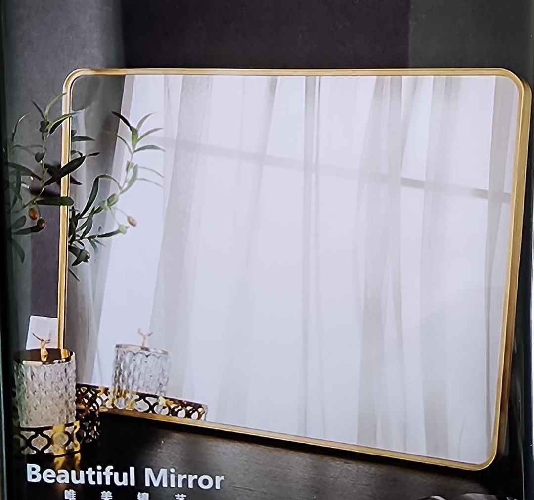 Solid brass mirror (Category: Bathroom & Kitchen Fixtures) located in Singapore. Submitted by kc_choypeter (Listing ID 1366777816, Image 1). Description: Brand new solid brass mirror for makeup or bathroom use. Will not tarnish. Size: 60x80 cm Do not compare with gold color aluminium framed mirror.