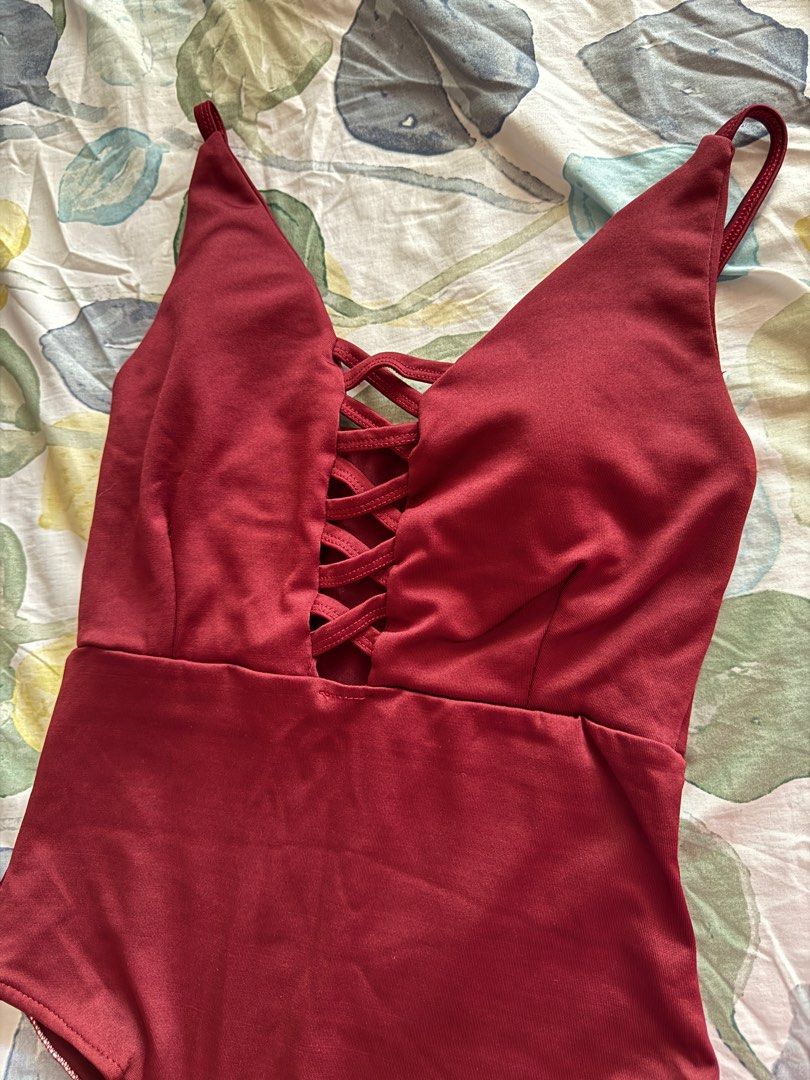 SALE - Swimsuit in red (Category: Bikinis & Swimsuits) located in Pasig City. Submitted by yssayay09 (Listing ID 1366772859, Image 2). Description: Fits to S and M Worn once.
