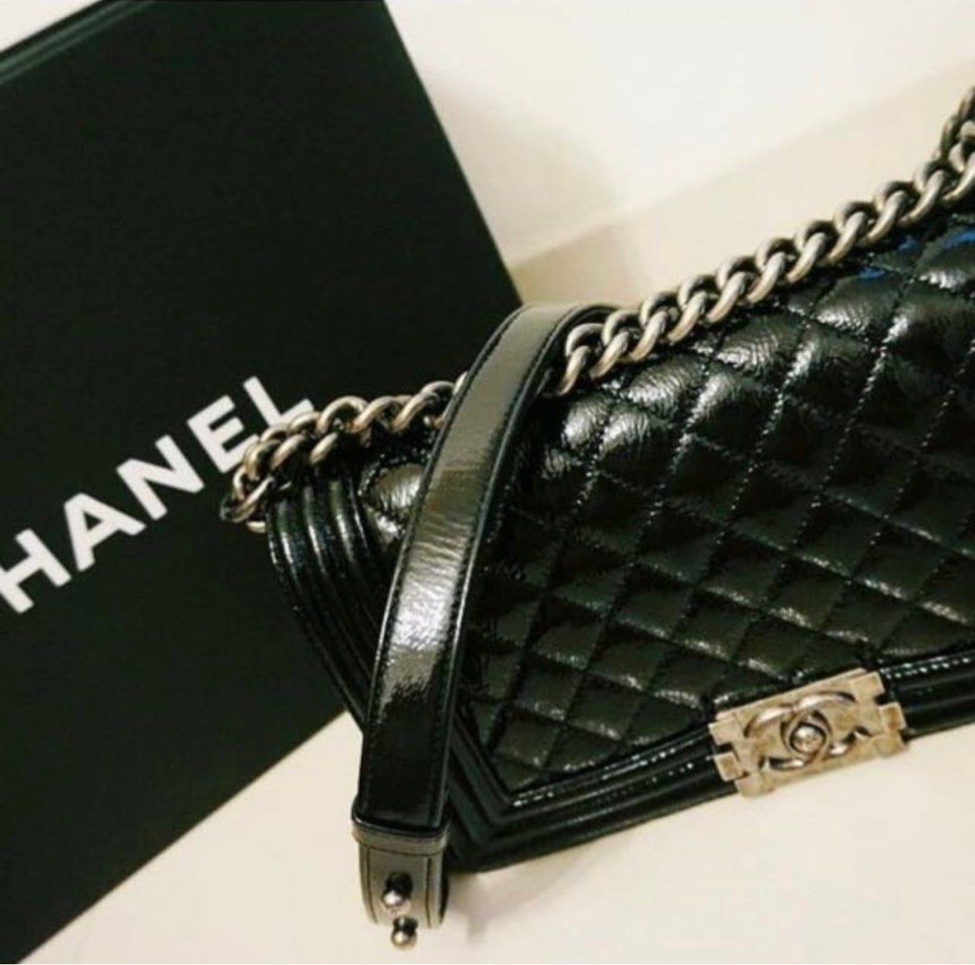 Black Patent Chanel Boy (Old Medium), Shoulder Bag (Category: Bags & Wallets) located in Singapore. Submitted by helloclearance (Listing ID 1366840029, Image 1). Description: 💯 authentic. Full set with box but no receipt. Authenticity card available. Very soft patent black with gun metal hardware. Keen pls pm. Slight negotiation can be discussed for this beautiful bag 🌟 .
