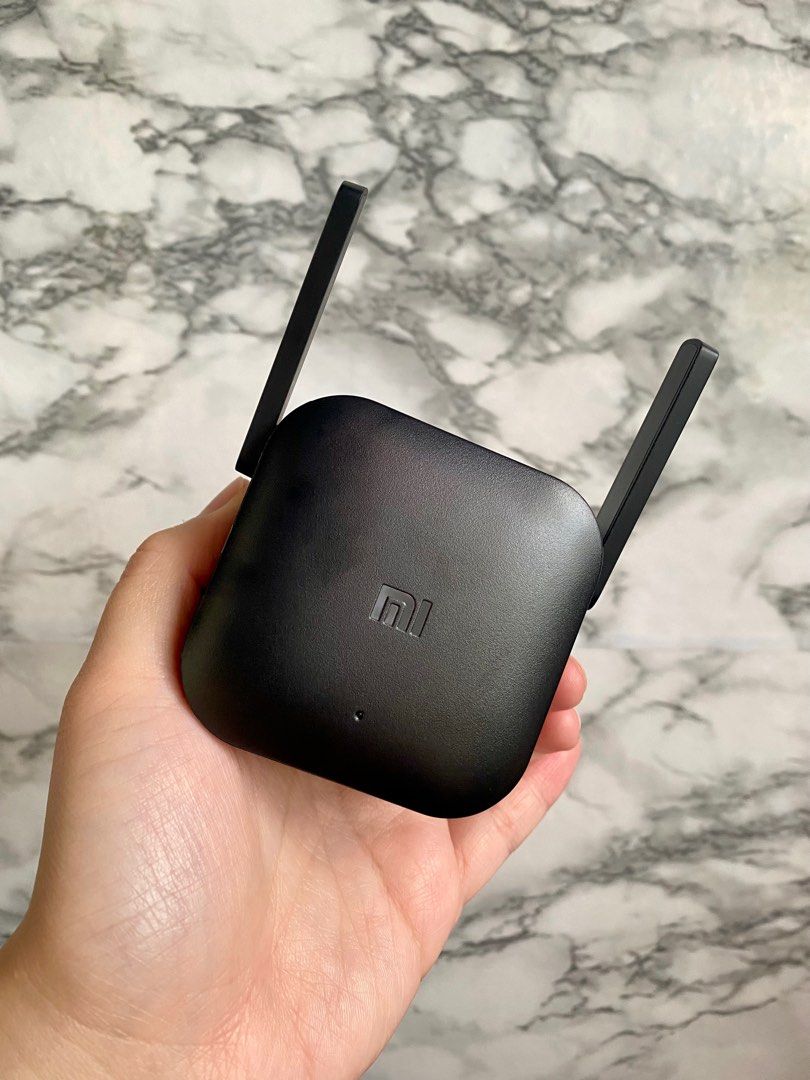 Wifi Extender Xiaomi (Category: Electrical, Adaptors & Sockets) located in Marikina City. Submitted by jayzevelasco (Listing ID 1366812408, Image 1). Description: Xiaomi Wifi Extender ₱450 only Without box Used once to test Marikina location.