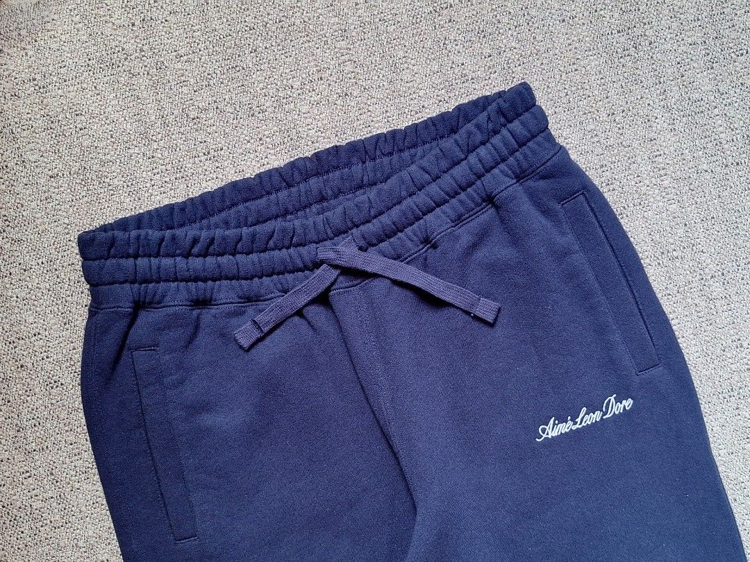 Aime Leon Dore / Sweatpants ( Authentic ) (Category: Joggers) located in Cebu City. Submitted by thehiddengemsbykid (Listing ID 1370188800, Image 2). Description: Aime Leon Dore Sweatpants Size : Medium Waist - 30 up to 42 max Rise - 13 Thigh - 13 Knee - 10 Length - 41 Leg opening - 5 Excellent Condition Emboirdery Logo No fades No issues 3,000 + Sf Thank you..
