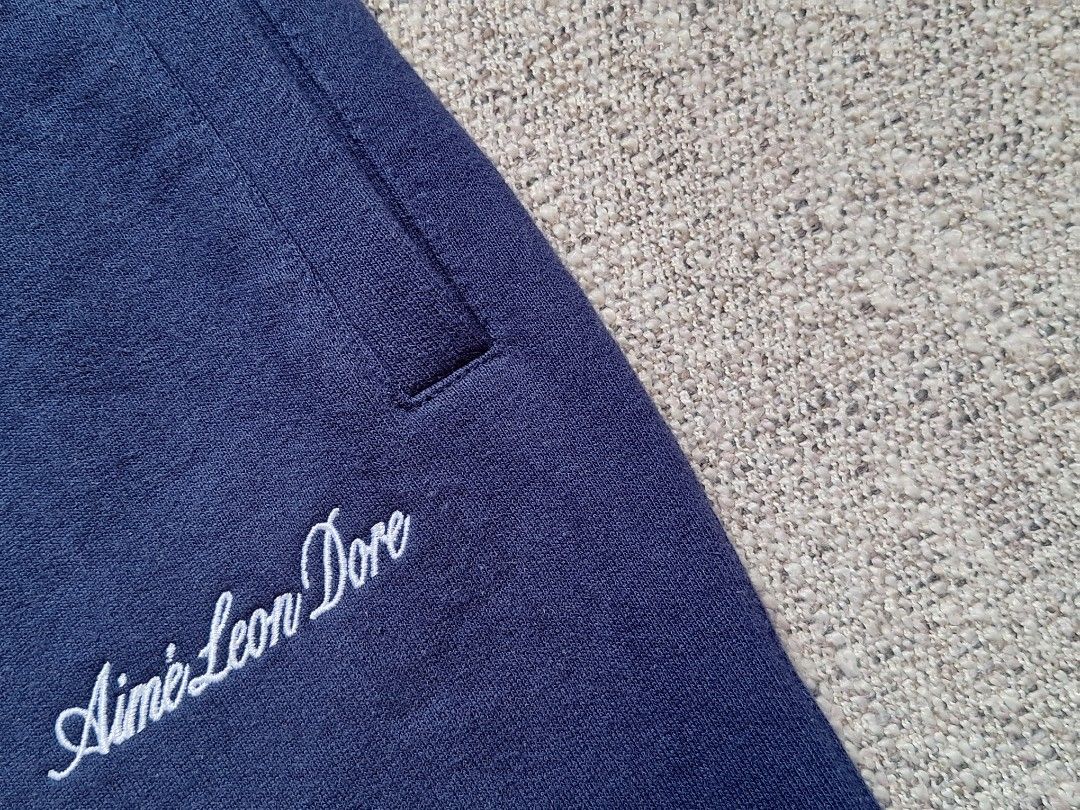 Aime Leon Dore / Sweatpants ( Authentic ) (Category: Joggers) located in Cebu City. Submitted by thehiddengemsbykid (Listing ID 1370188800, Image 3). Description: Aime Leon Dore Sweatpants Size : Medium Waist - 30 up to 42 max Rise - 13 Thigh - 13 Knee - 10 Length - 41 Leg opening - 5 Excellent Condition Emboirdery Logo No fades No issues 3,000 + Sf Thank you..