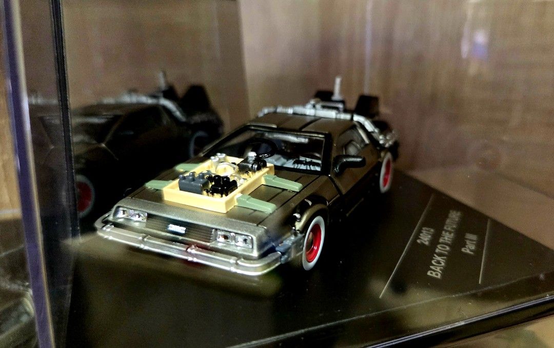 Back to the Future Delorean set 1:43 (Category: Vehicle & Diecast Models) located in Las Pinas. Submitted by run800 (Listing ID 1370106475, Image 2). Description: Rare Back to the Future Delorean set Brand: Vittesse Scale: 1:43 In great condition With acrylic case last 2 photos, recent sold from Ebay Payment via: BPI / Gcash Location: Laspinas City Shipping/Lalamoveat buyers expense. Please manage your booking..