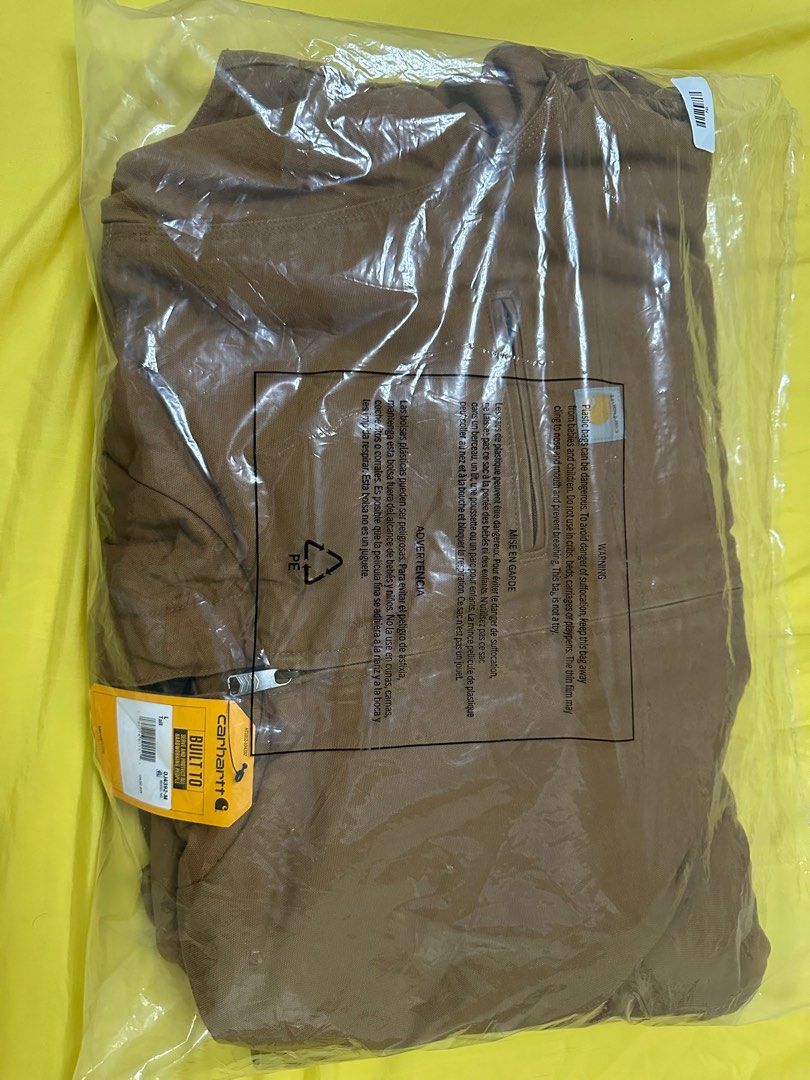 BNEW Carhartt 104392 Washed Duck Jacket (Category: Coats, Jackets and Outerwear) located in Manila. Submitted by alim003 (Listing ID 1370161902, Image 1). Description: Brand new Carhartt Washed Duck Jacket in classic carhartt brown Size L-Tall, 3-Warmest Rating Can be used in during cold weather Rfs: already have one in another color.