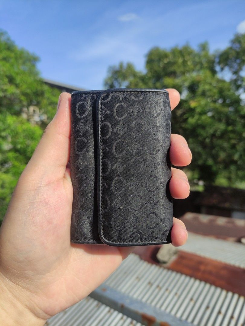 Celine Monogram Key case (Category: Luxury Bags & Wallets) located in Manila. Submitted by maxxxxxxxxxxxx (Listing ID 1370219693, Image 2). Description: for sale vintage Celine keycase black monogram leather interior with one card slot.