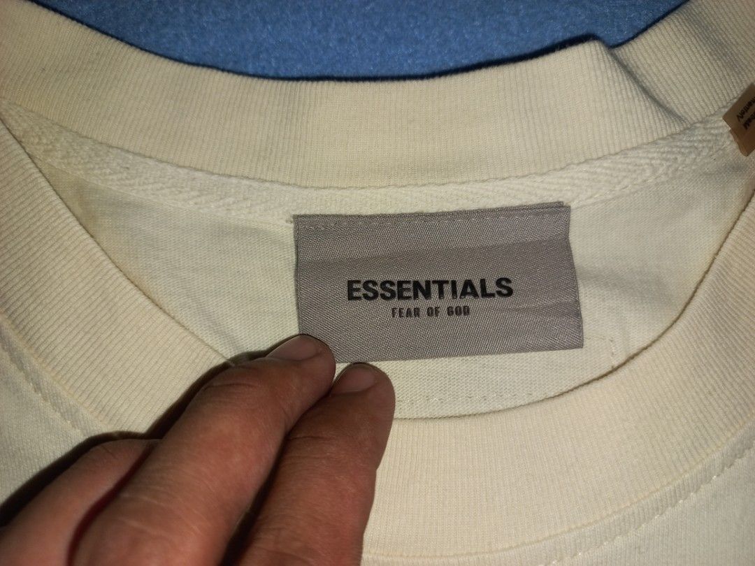 essentials fear of god logo shirt (Category: Tshirts & Polo Shirts ) located in Makati City. Submitted by coleencloset (Listing ID 1370240587, Image 2). Description: size: L os condition rate: 9/10 condition: good issue: pin hole check the detailed pic rfs: need cash mop: gcash NO COD OR COP additional ship fee ALL SALES are FINAL, NO RETURNS buy with confidence! details are based on the condition of the item rating 1-10 NOTE: this item is ( PRE-