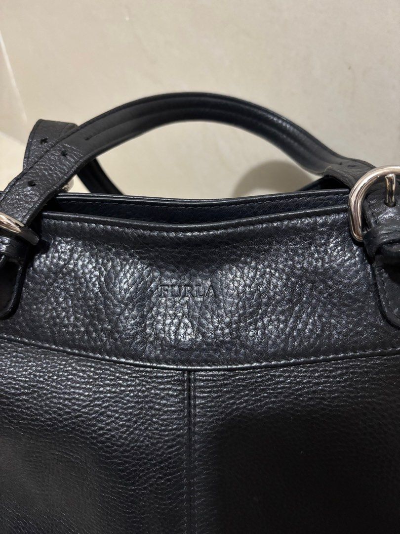 Furla Black Leather Hobo Bag (Category: Luxury Bags & Wallets) located in Manila. Submitted by declutterwithbeyuh (Listing ID 1370204420, Image 1). Description: genuine leather.