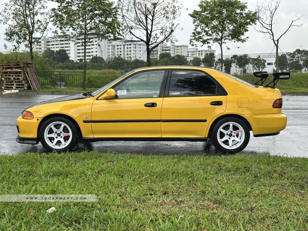 Honda Civic VTI EG9 Manual (Category: Used Cars) located in Singapore. Submitted by astralisautomobile (Listing ID 1370114752, Image 3). Description: B16A2 engine. 15" TE37, EK9 Recaro seats, B18 cams, 400cc injector, K20 coil, S90 throttle body, Skunk2 intake, Invidia Exhaust w/cert, Hybrid racing SS, etc. New stock just arrived! Car is in good condition, clean and neat interior. No weird noises when driving. Flexible loan available. Trade in we