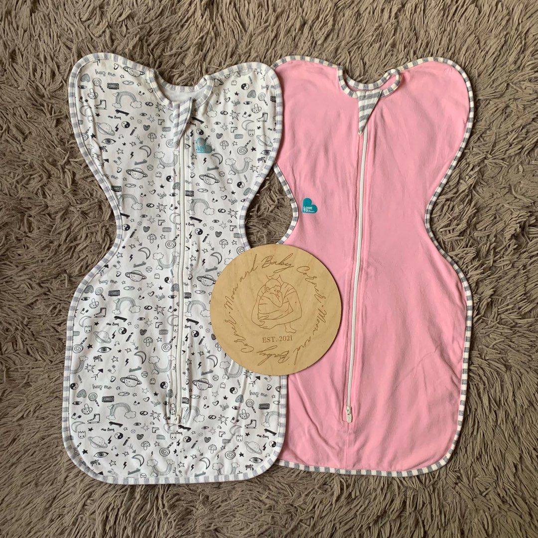 Love to dream swaddle pink and white printed bundle (Category: Babies & Kids Fashion) located in Cabiao. Submitted by MomAndBabyCorner (Listing ID 1370186959, Image 1). Description: Love to dream Small | 0/3 mos 1.0 TOG EUC but with minimal stain PHP 1050.