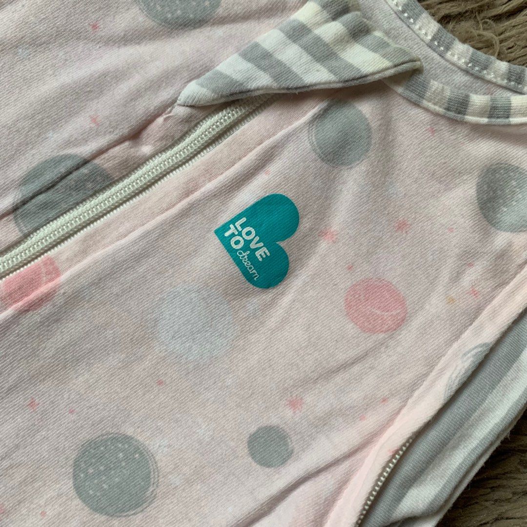Love to dream transition swaddle (Category: Babies & Kids Fashion) located in Cabiao. Submitted by MomAndBabyCorner (Listing ID 1370178631, Image 2). Description: Love to dream Medium | 3/6 mos 0.2 TOG EUC to Like New yung cloth but with minimal stain du to long term storage No zipoff wings included PHP 400 .