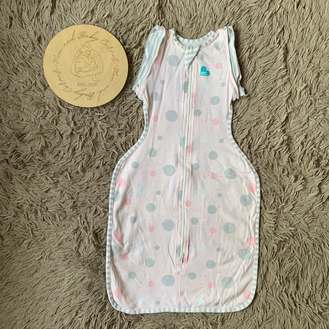 Love to dream transition swaddle (Category: Babies & Kids Fashion) located in Cabiao. Submitted by MomAndBabyCorner (Listing ID 1370178631, Image 1). Description: Love to dream Medium | 3/6 mos 0.2 TOG EUC to Like New yung cloth but with minimal stain du to long term storage No zipoff wings included PHP 400 .