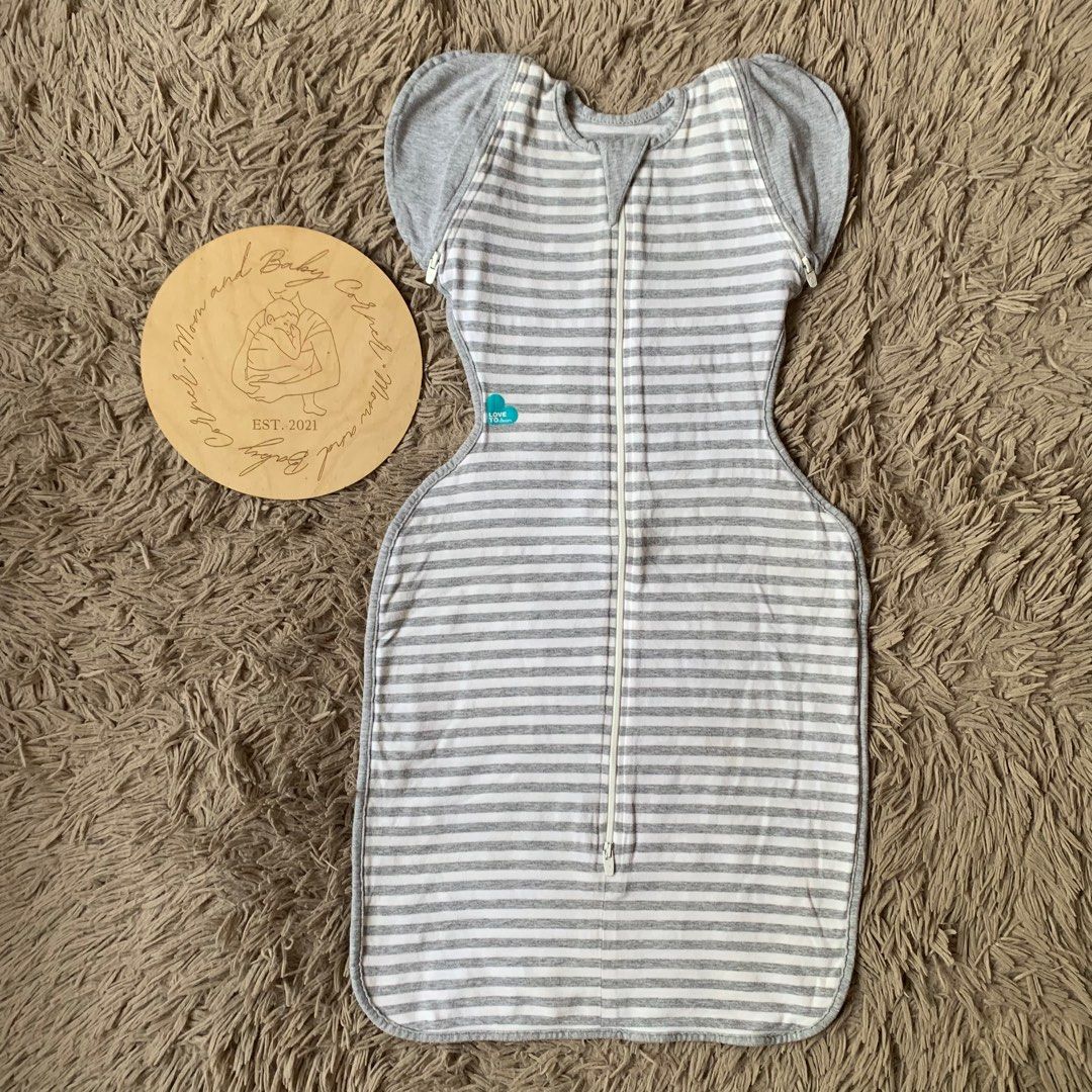 Love to dream transition swaddle (Category: Babies & Kids Fashion) located in Cabiao. Submitted by MomAndBabyCorner (Listing ID 1370178896, Image 1). Description: Love to dream Medium | 3/6 mos 50/50 TOG EUC but with small stain sa back PHP 600.