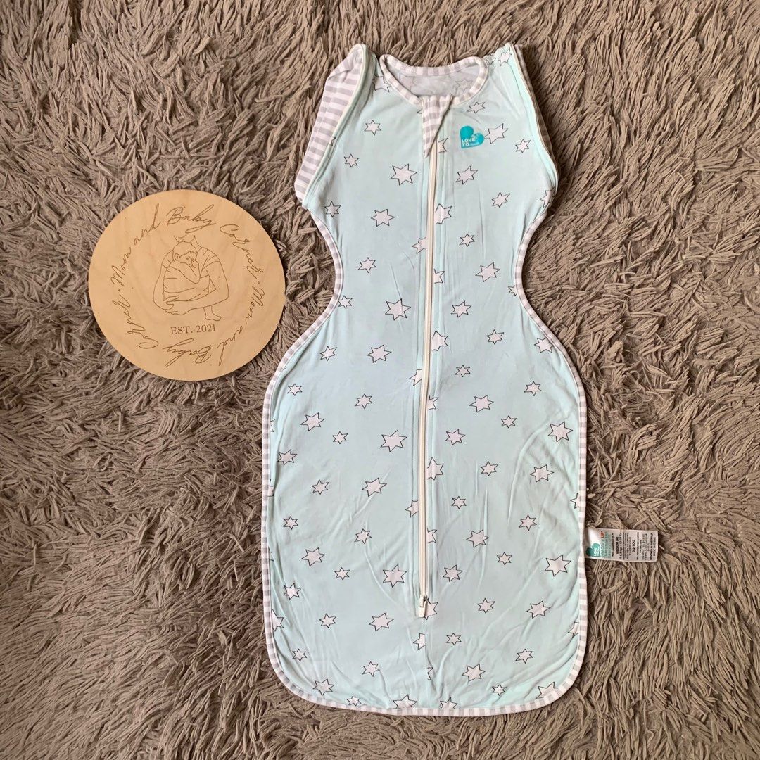 Love to dream transition swaddle (Category: Babies & Kids Fashion) located in Cabiao. Submitted by MomAndBabyCorner (Listing ID 1370185852, Image 1). Description: Love to dream Medium | 3/6 mos 0.2 TOG EUC but crack print yung logo No zipoff wings included PHP 400.