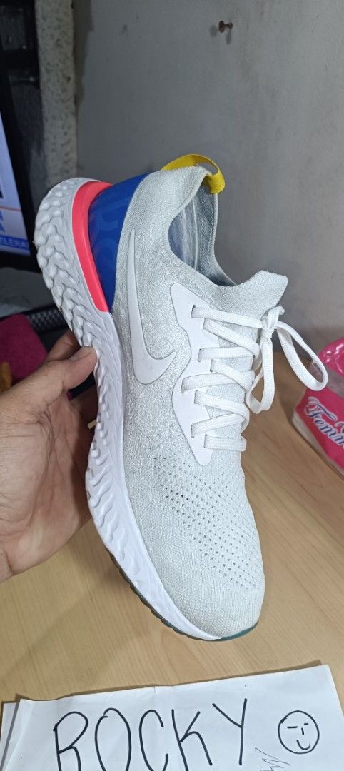 Nike Epic React Flyknit Running Shoes (18017) (Category: Sneakers) located in Manila. Submitted by rockymagna82486 (Listing ID 1370246403, Image 2). Description: pre loved authentic good condition minor heel drag us men's 10 pass sa swap (trusted seller with over 100 5 stars rating) location Cubao qc.