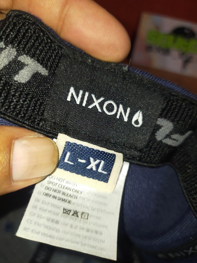 Nixon x Yupoong flexfit cap (Category: Caps & Hats) located in Jolo. Submitted by squad_exe_v2.0 (Listing ID 1370229787, Image 3). Description: Color rate: 9.3/10 in very good condition have some flaws (embroidery) and minimal stain, size large- xlarge MOP: GCASH COURIER: JNT ONLY.