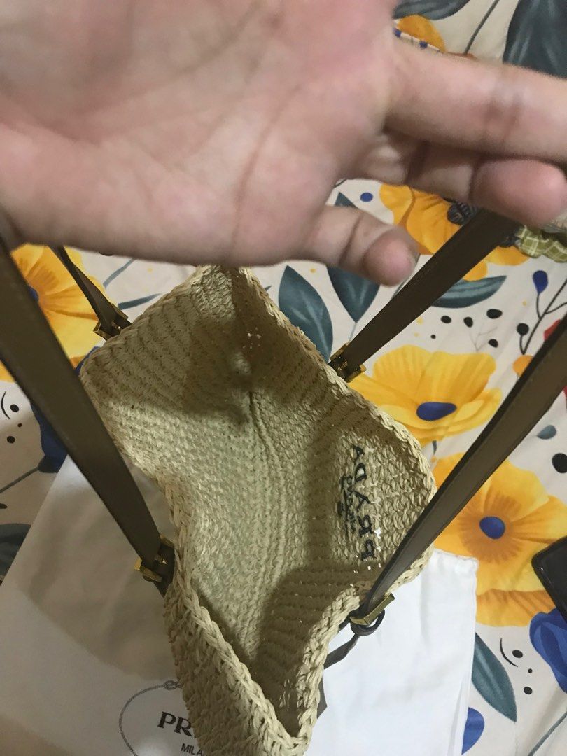 Prada beach bag (Category: Luxury Bags & Wallets) located in Taguig. Submitted by dean_cute25 (Listing ID 1370183590, Image 3). Description: Korea source Prada engrave Adjustable strap.