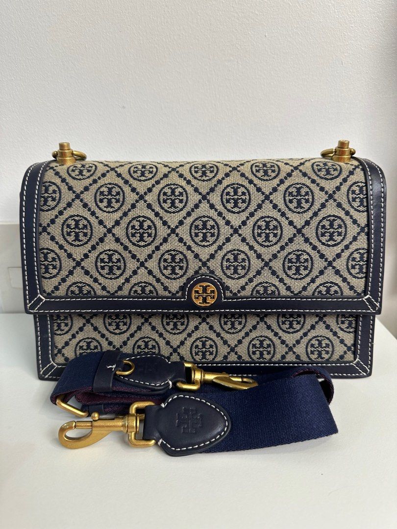 Tory Burch Monogran Shoulder Bag (Category: Luxury Bags & Wallets) located in Pasig City. Submitted by mitchie24 (Listing ID 1370093219, Image 1). Description: Used a few times only. Please see last picture for flaws. Unfortunately, I forgot where I stored the dustbag thus, some scratches at the bottom. .
