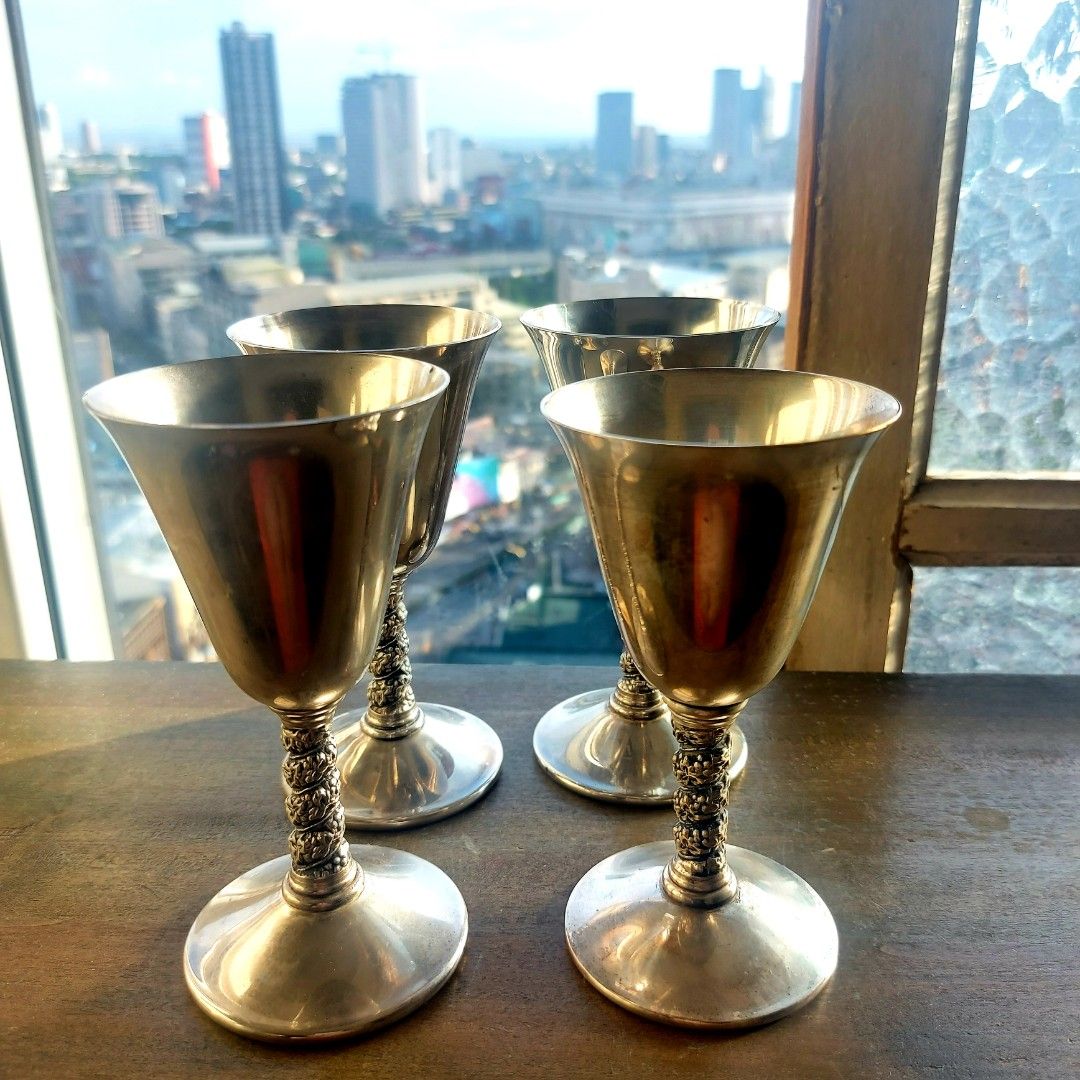 VINTAGE SILVER PLATED GOBLET (Category: Other Kitchenware & Tableware) located in Manila. Submitted by georgina123place (Listing ID 1370241195, Image 1). Description: a silver-plated wine goblet, likely a vintage piece from Valero, Spain, dating between 1900-1940. These goblets often feature a grapevine design on the stem and are about 4.5 inches tall. Key details: Material: Silver-plated. Origin: Made in Spain by Valero.Design: Grapevine design 
